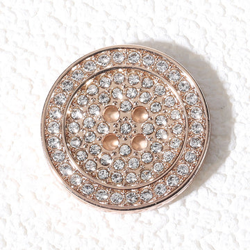 Round flat rhinestone metal button, rose-gold tone with clear stones and 4-hole center