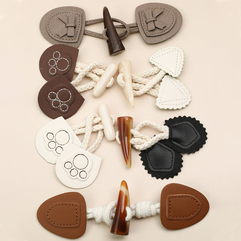 Leather and resin horn coat buttons in mixed colors: white, black, tan, brown