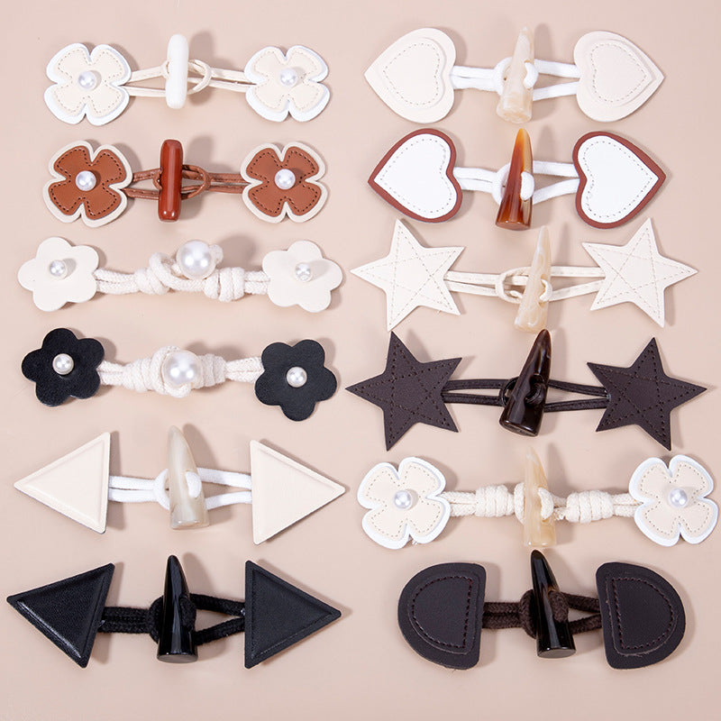 Set of 12 toggle buttons with faux leather flower and heart shapes, faux pearls, horn clips