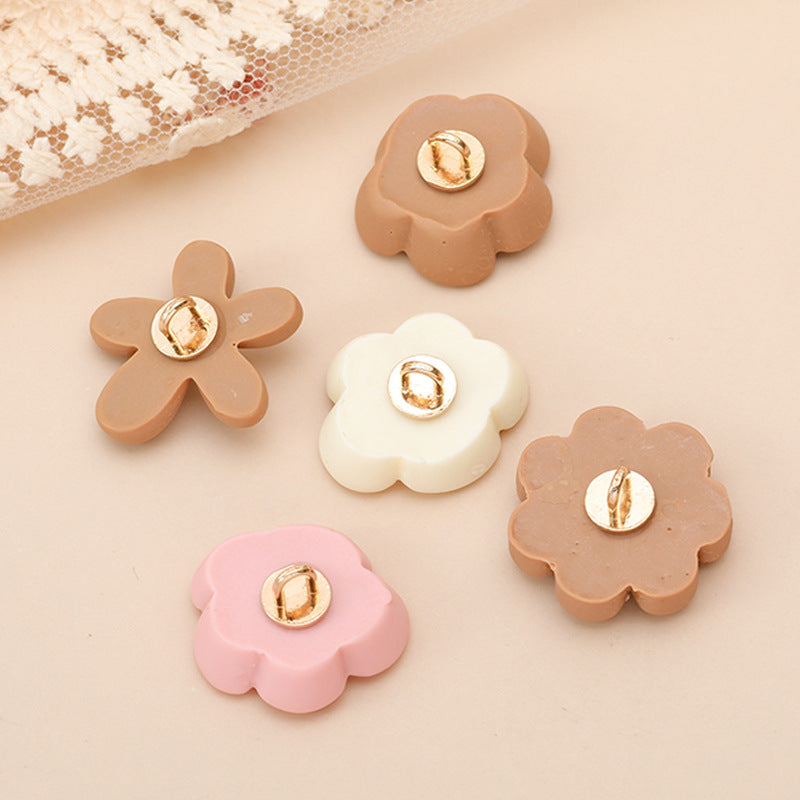 Colorful flower resin buttons with gold-tone shanks, tan, white, pink, and brown