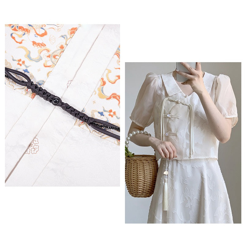 Black snake-knot braid frog button trim on white blouse