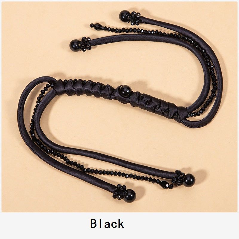Black snake-knot braided cord set with glossy bead tips and knot detail