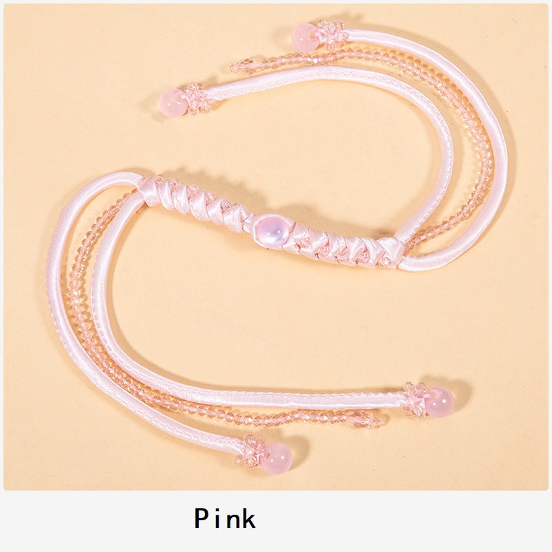 Pink snake-knot braided cord set with crystal bead tips and woven knot detail