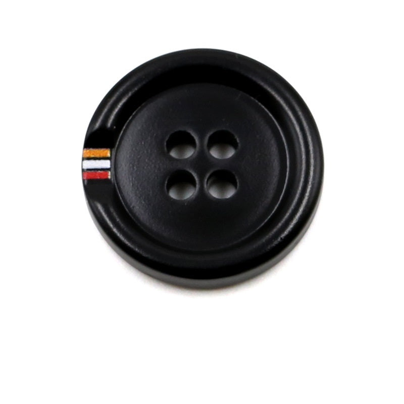 Black four-hole round resin button with colorful print stripe