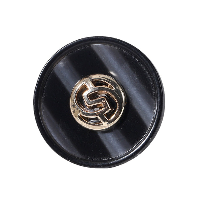 18–25mm round resin buttons, black with gold-tone geometric linked pattern