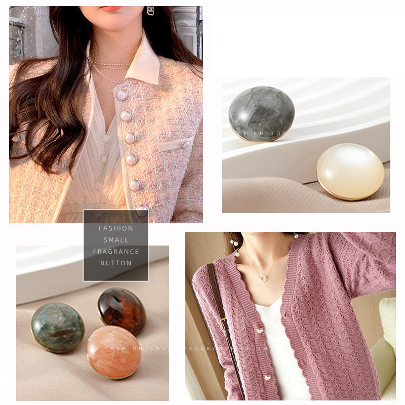 Cat’s eye resin buttons on a jacket front, showing pearl gray and ivory tones