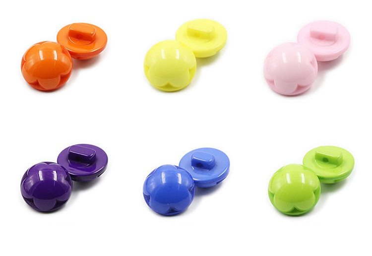 Assorted pastel flower resin buttons: orange, yellow, pink, purple, blue, green, glossy