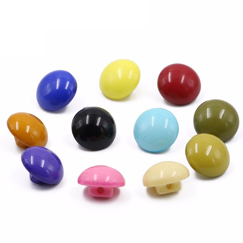 20 candy-colored round mushroom resin buttons, assorted colors including black and red