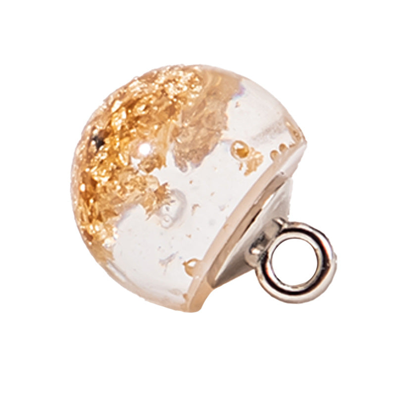 Clear resin pearl button with gold foil flecks and metal loop, round