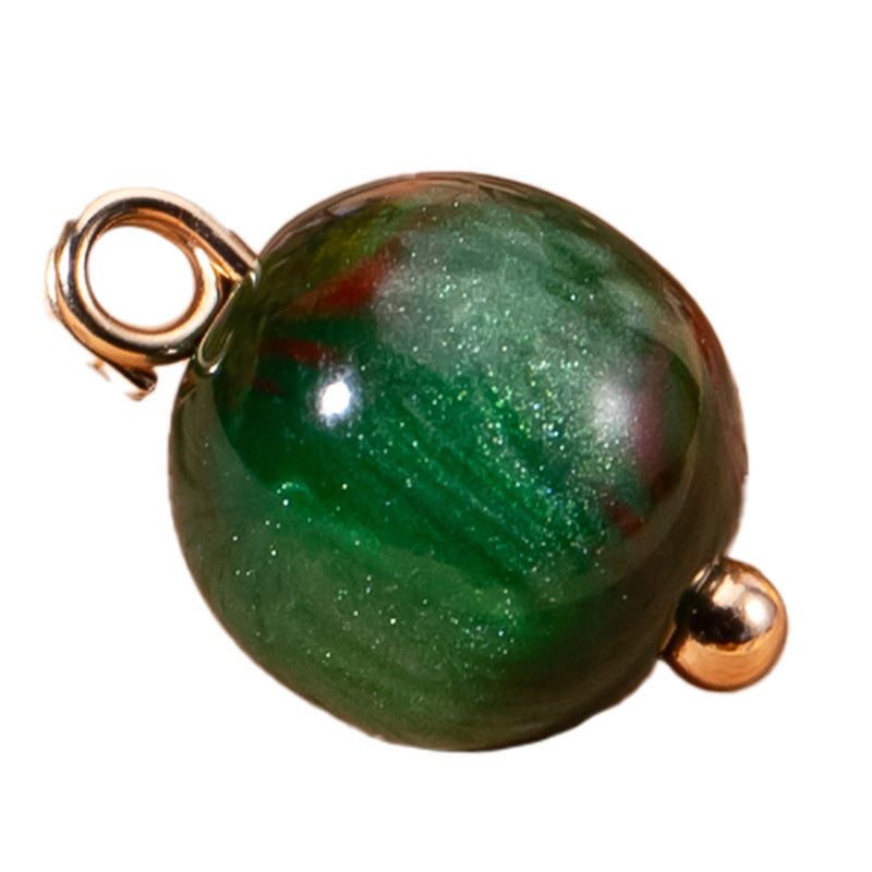 Green pearlescent resin round bead button with metal loop and gold-tone back bead