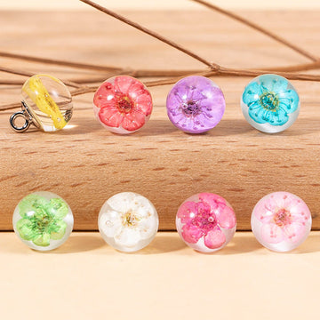 Transparente Blütenknöpfe aus Resin, 8er Set: gelb, pink, lila, blau, grün