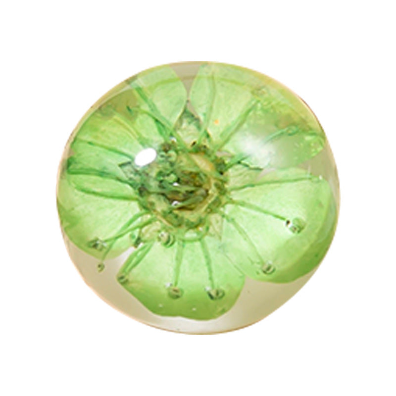 Grüner transparenter Resin-Blütenknopf, rund, mit getrocknetem Blumenmotiv in der Mitte