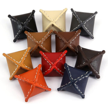Set of 10 rhombus leather buttons with stitched X design, assorted colors