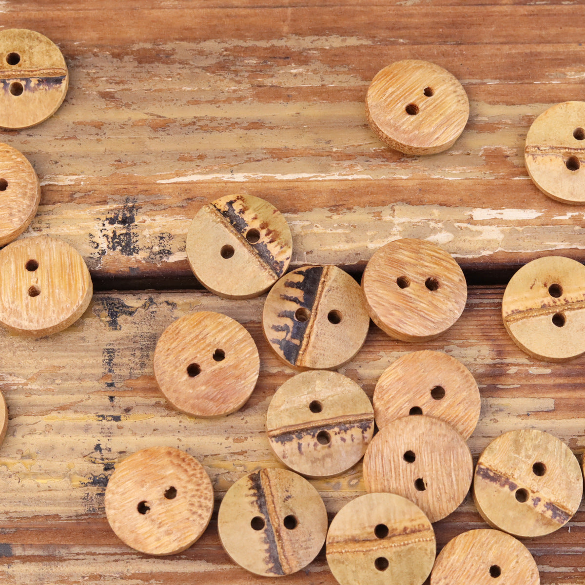 Mixed natural bamboo 2-hole buttons, round tan pieces with two holes