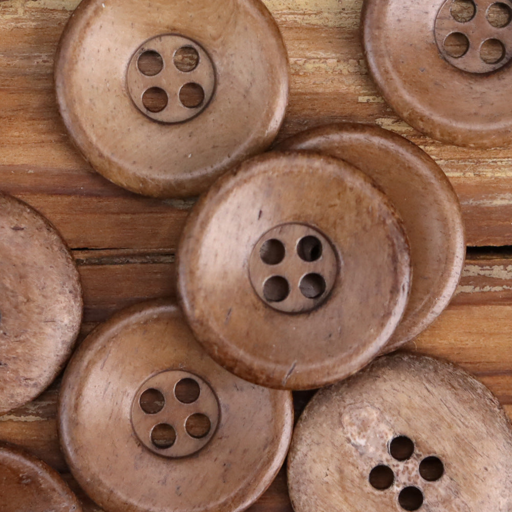 Coffee-brown bowl-shaped distressed bone buttons with 4-hole fronts, grouped