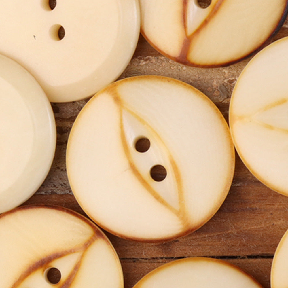 Off-white palm nut shell buttons with amber veining, 2 holes