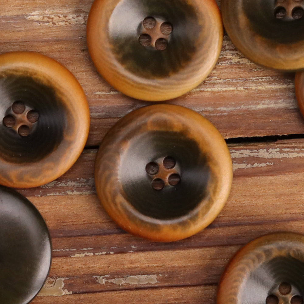 Multiple nut shell buttons in warm tan and dark brown tones, 4-hole design