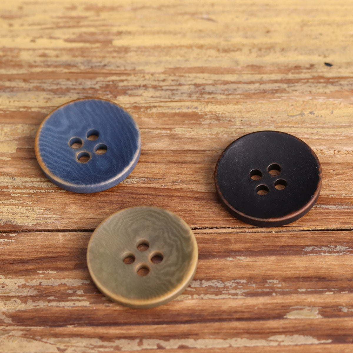 Blue, black, and light green 4-hole natural fruit buttons, 12 pcs.