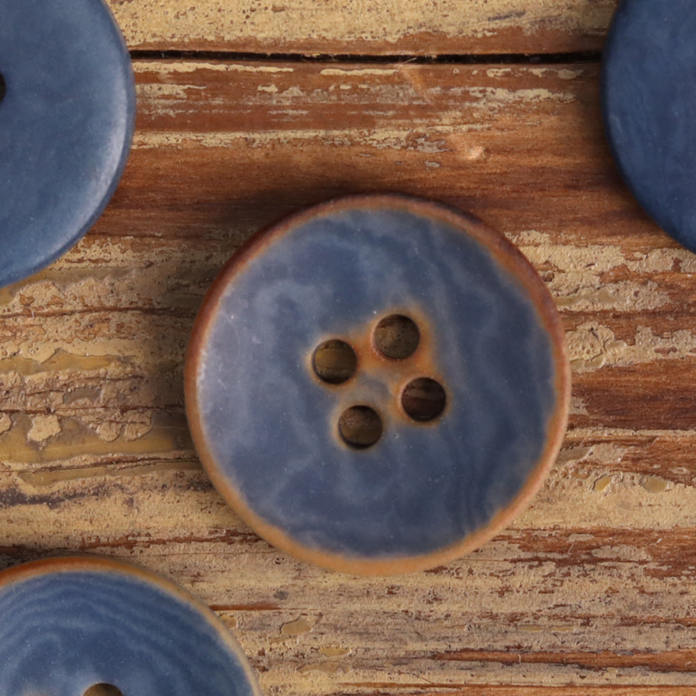 Blue 4-hole natural fruit button with dark burned edge, 12 pcs.