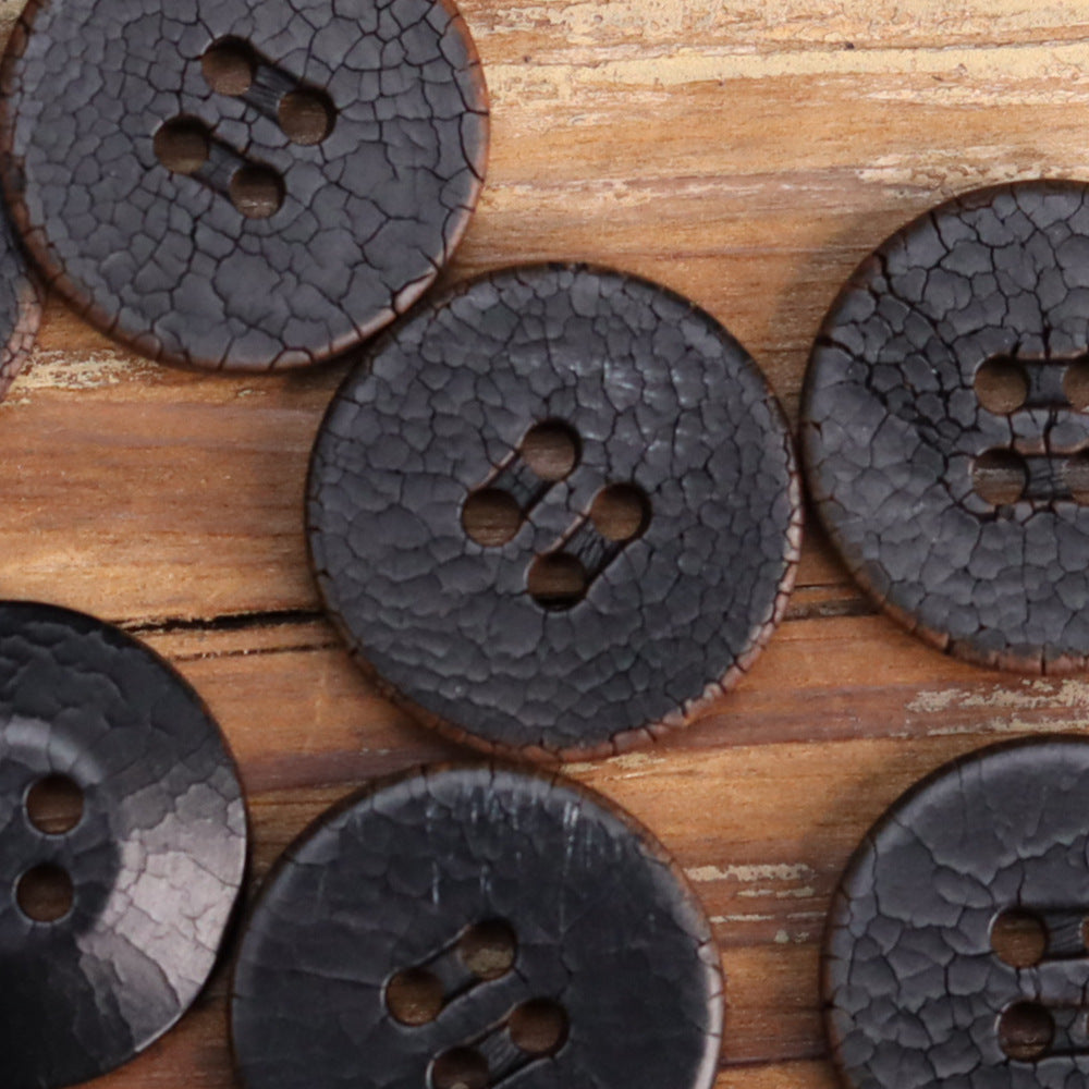 Cracked fruit buttons in dark charcoal/black with 4-hole faces