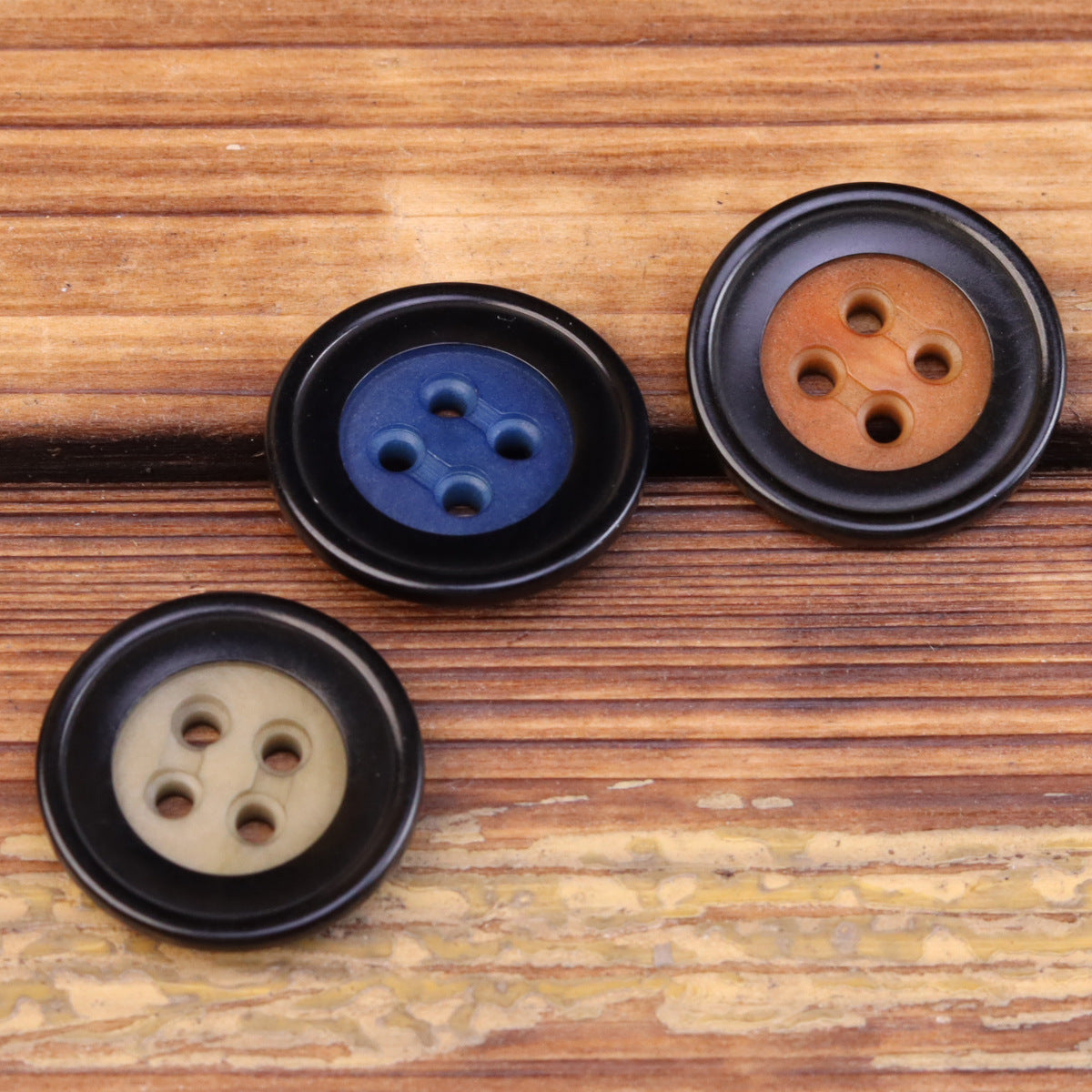 Palm fruit shell buttons for jackets, 4-hole: blue and brown-orange, dark rims