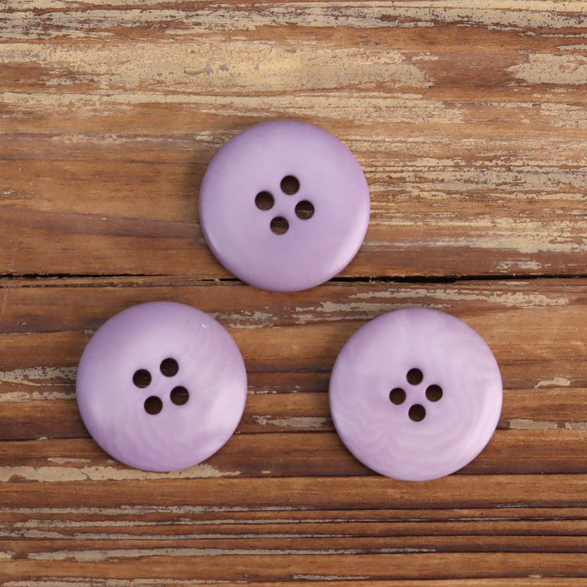 Lilac purple 4-hole corozo buttons set; three round fronts