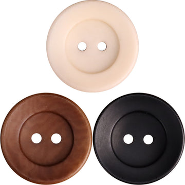 Two-hole corozo buttons: cream, brown, and black, round bowl-shaped design