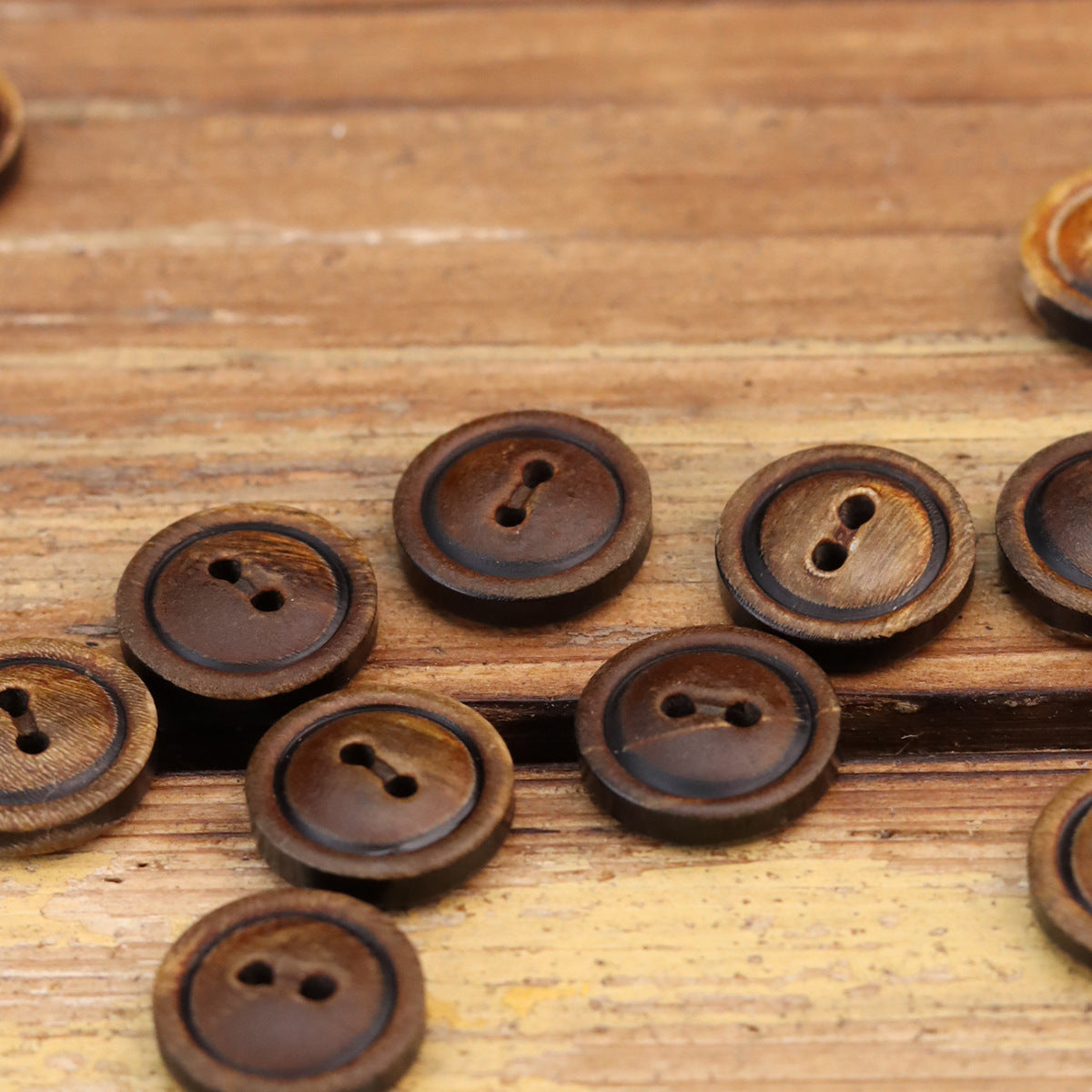 20-pack of round two-hole buttons in dark brown and burned tones, assorted layout