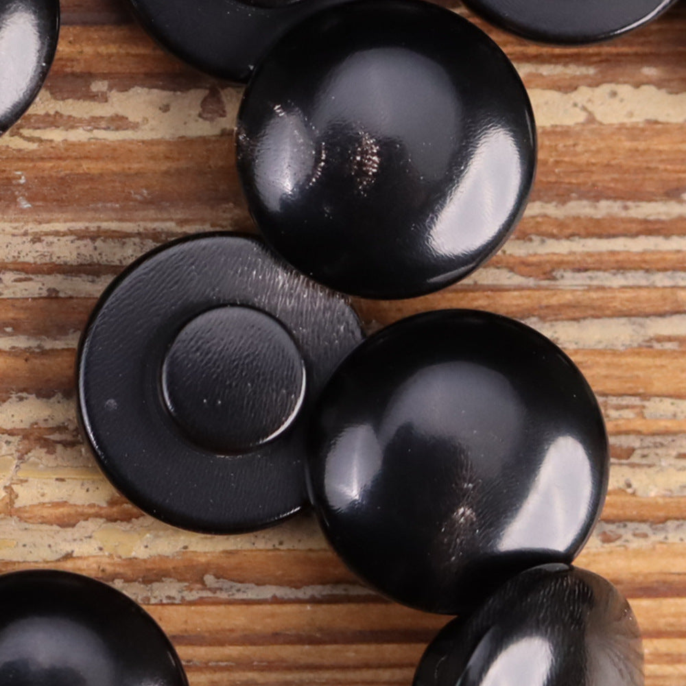 Black horn shank buttons 11.5/12.5mm, close-up domed faces and shank openings