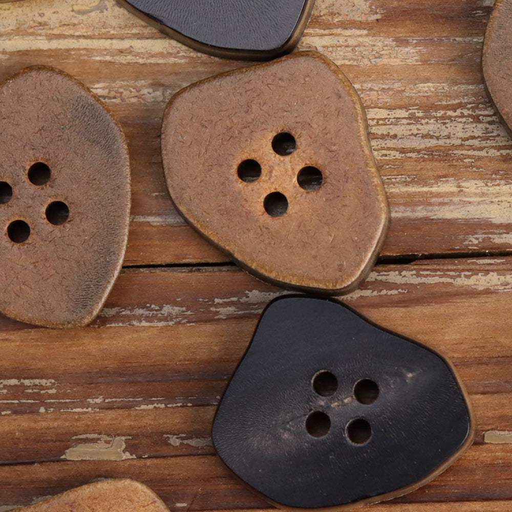 Mixed burnt coffee and burnt black irregular horn buttons with 4 holes