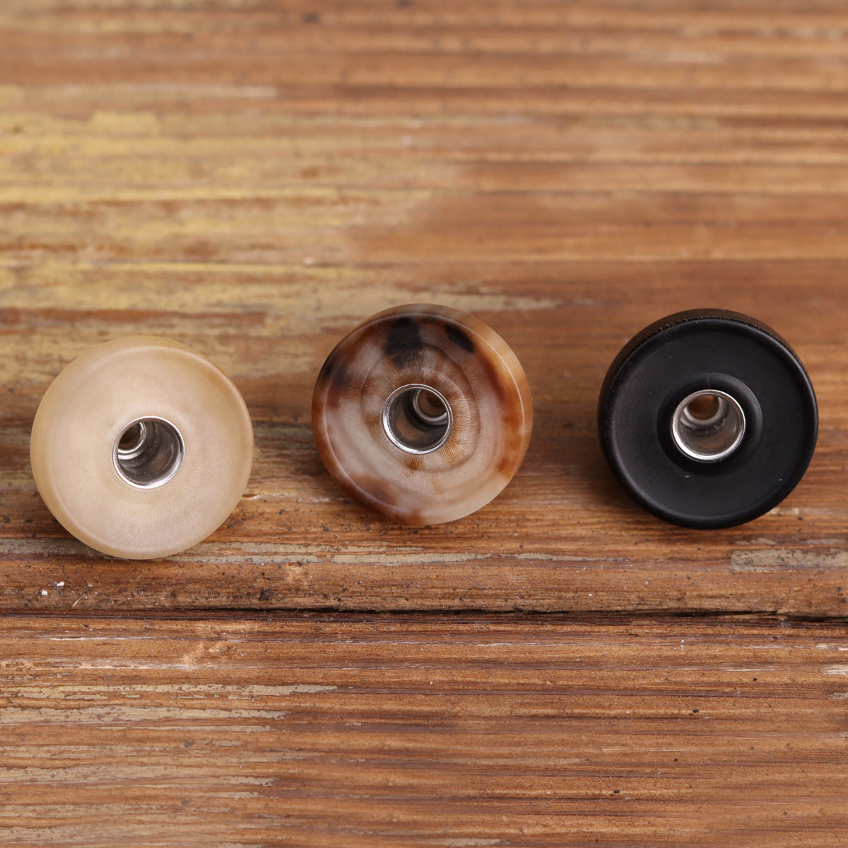18mm matte horn rivet stud buttons on wood: light beige, brown, and black