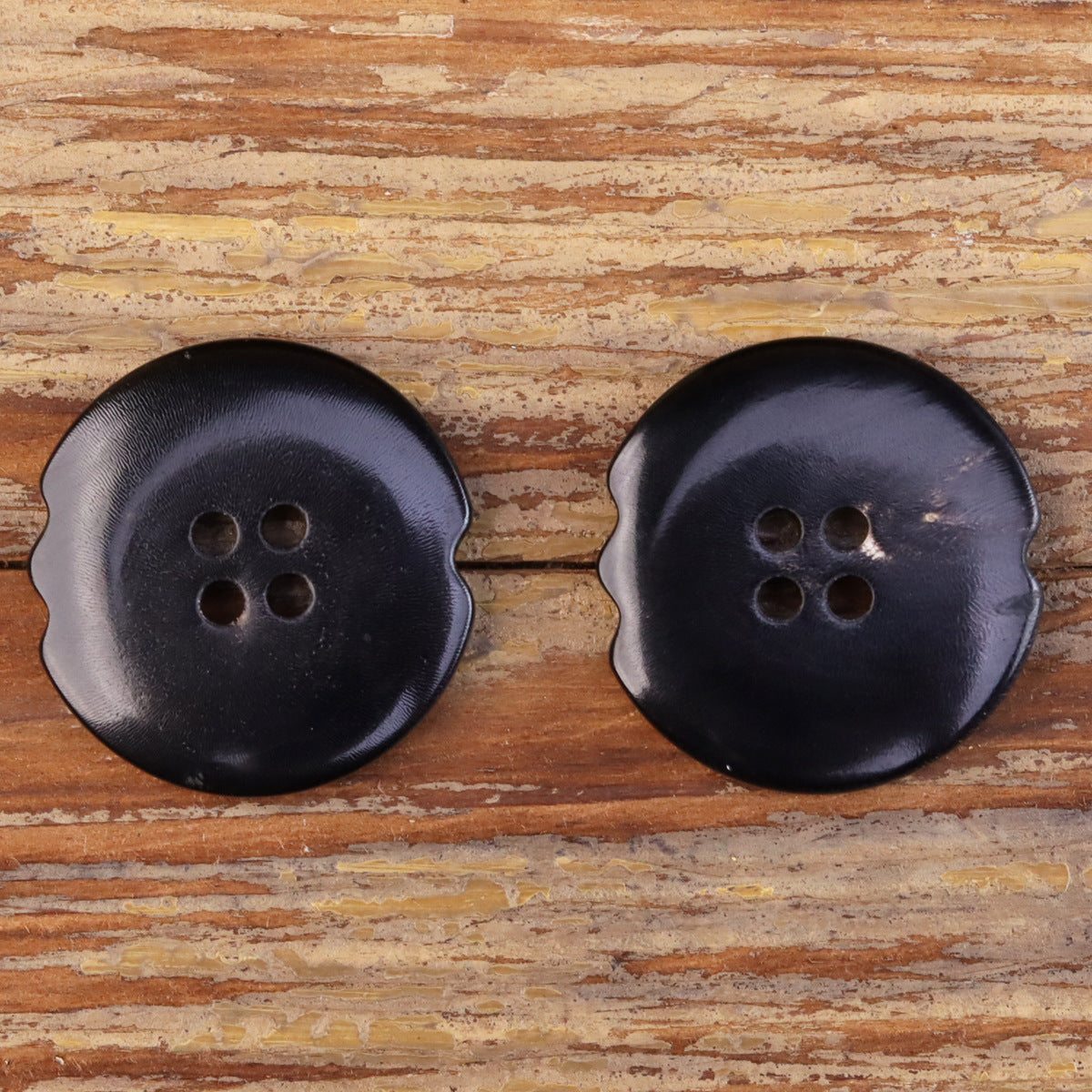 Burnt black irregular natural horn-look buttons, round scalloped edge, 4 holes