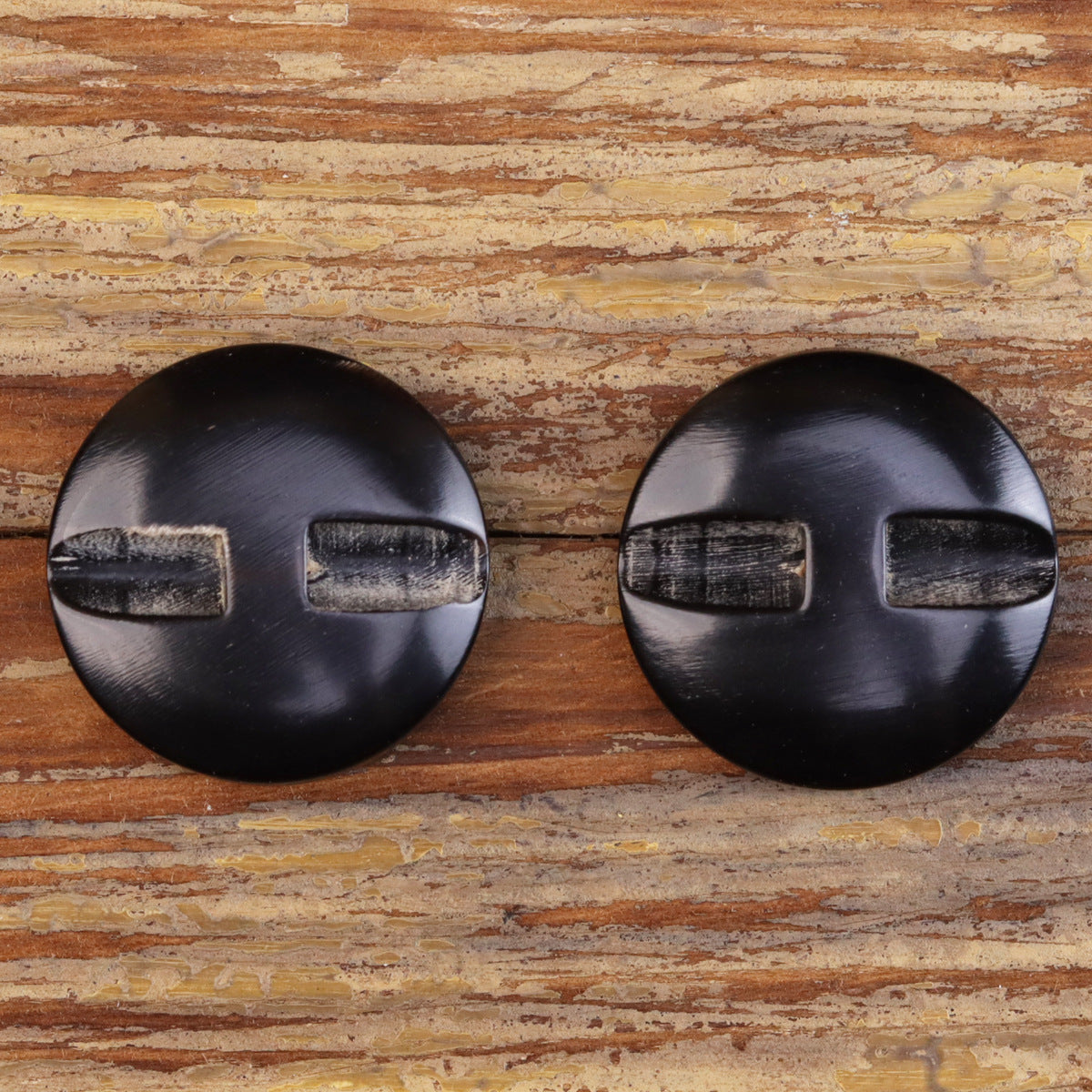 Round coat buttons, faux horn look, dark black with rectangular raised accents (2 pcs)