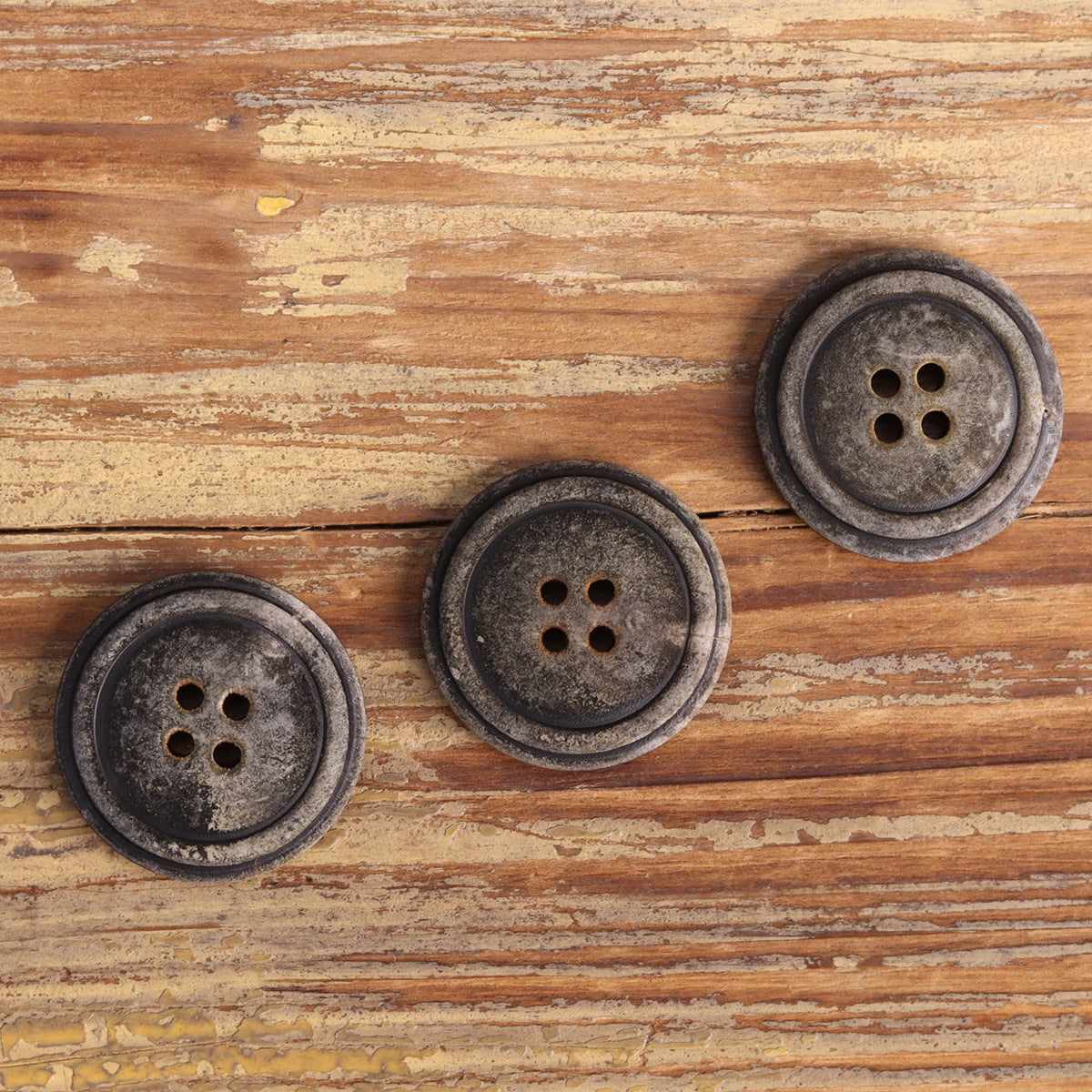 Set of gray-black natural horn buttons, round style with 4-hole design (3 pcs)