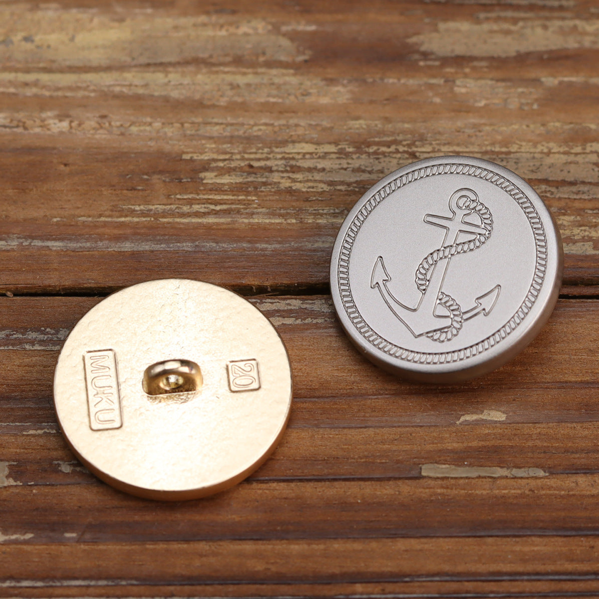 Silver anchor button front and rose gold back, round with central shank hole