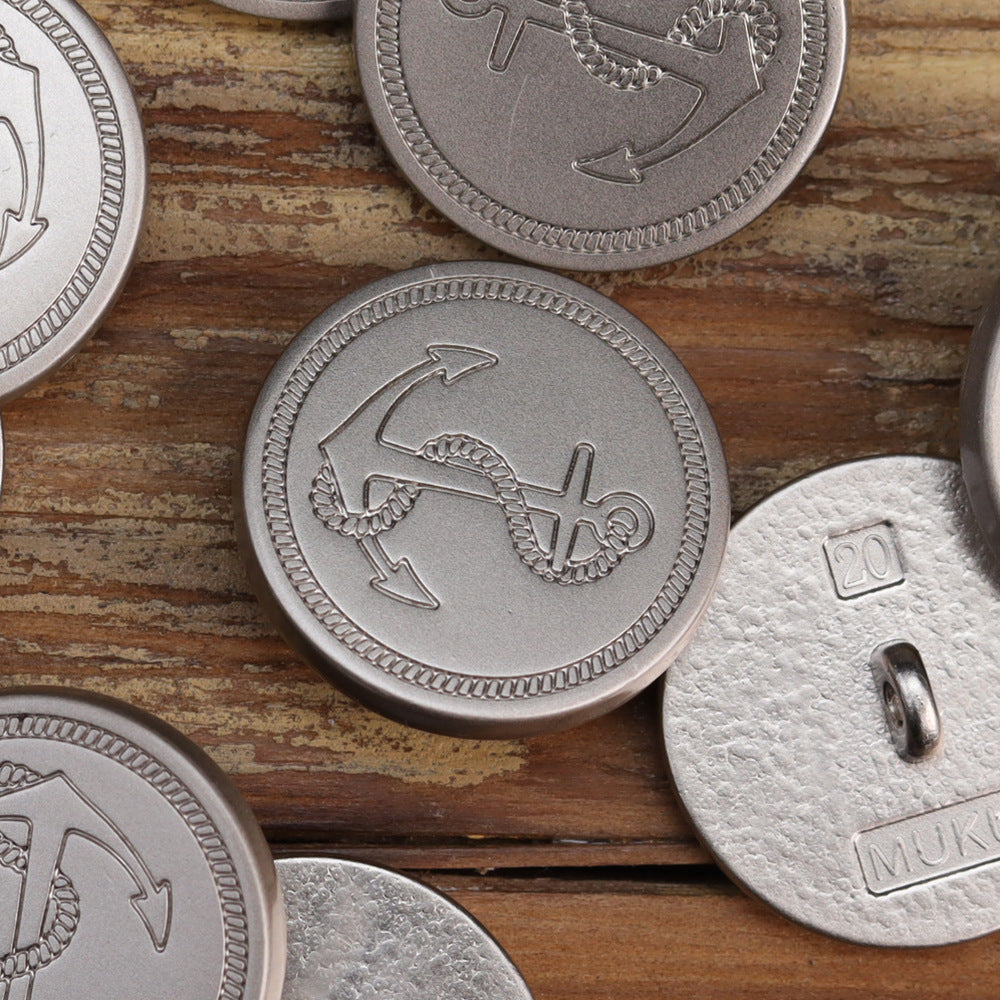 Shiny silver anchor button front and back plate, round with central shank hole