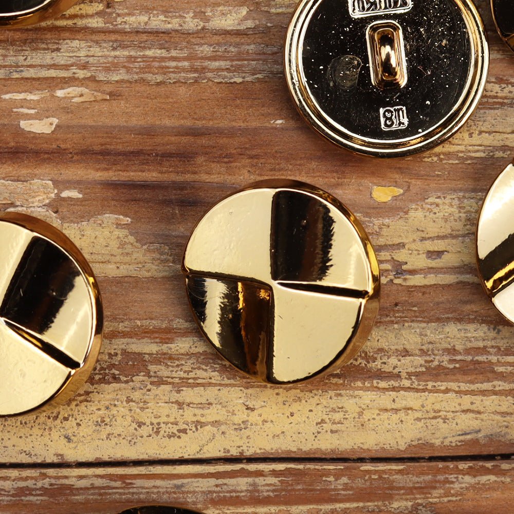 Shiny gold round metal button with high-gloss four-panel cross design