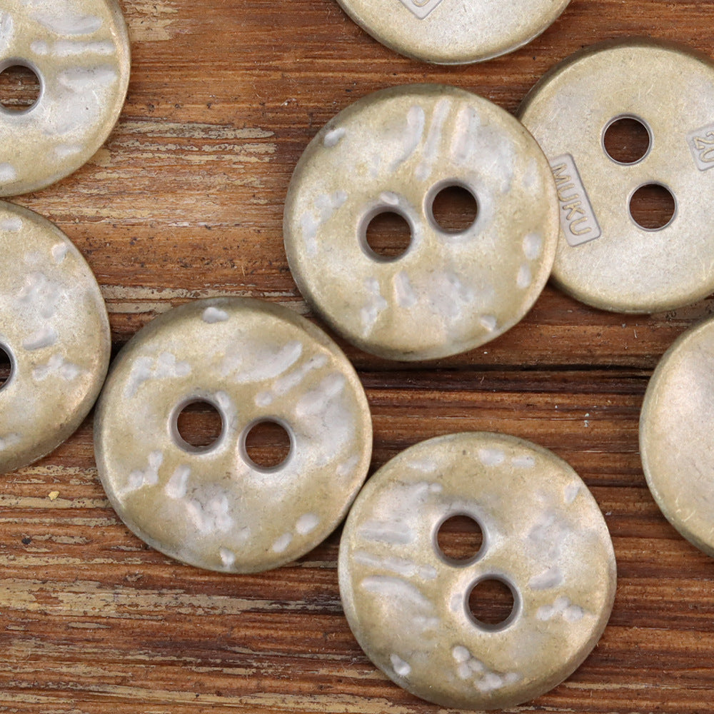 Cyan tin irregular two-hole metal buttons with weathered speckled texture