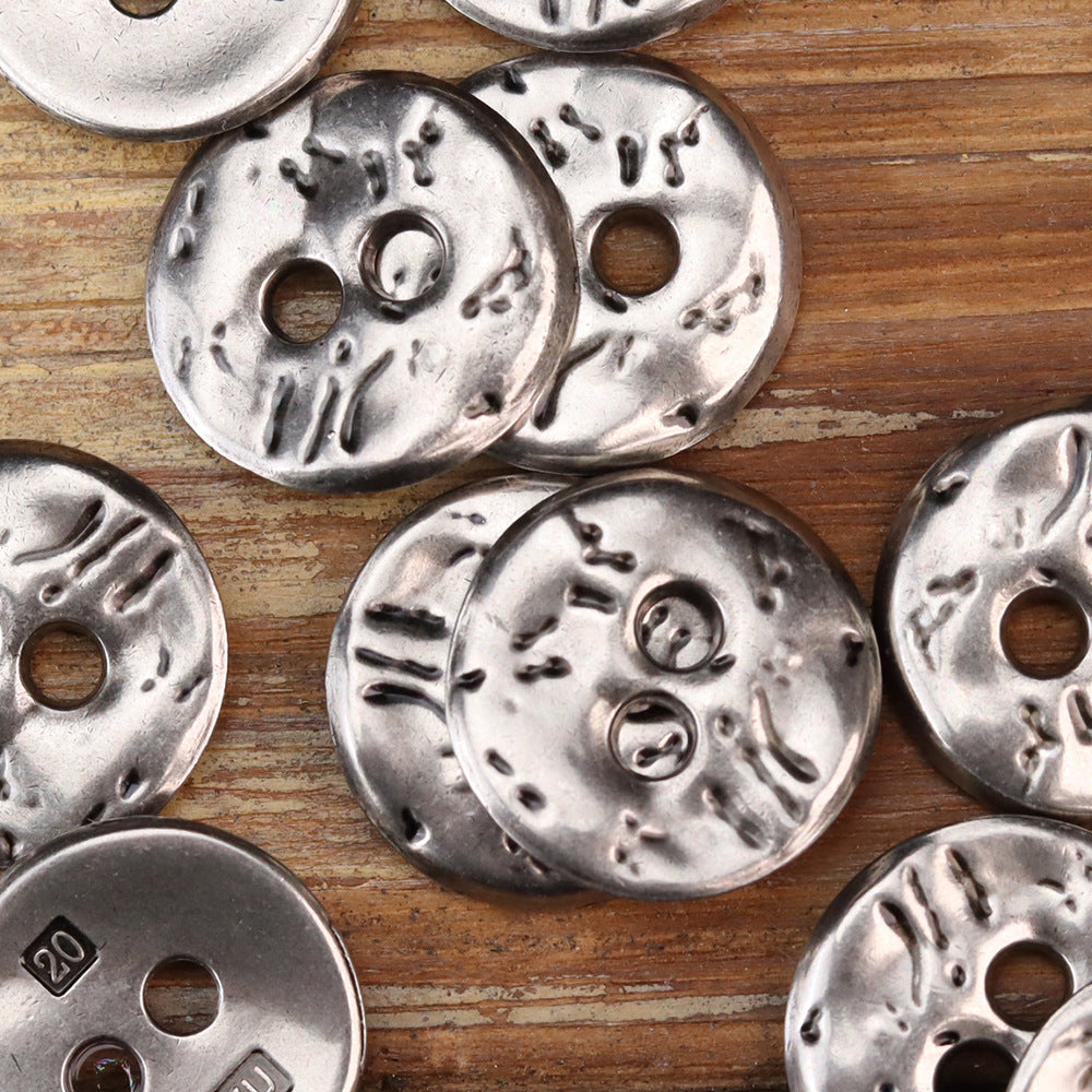 Antique silver irregular two-hole metal buttons with mottled speckle texture