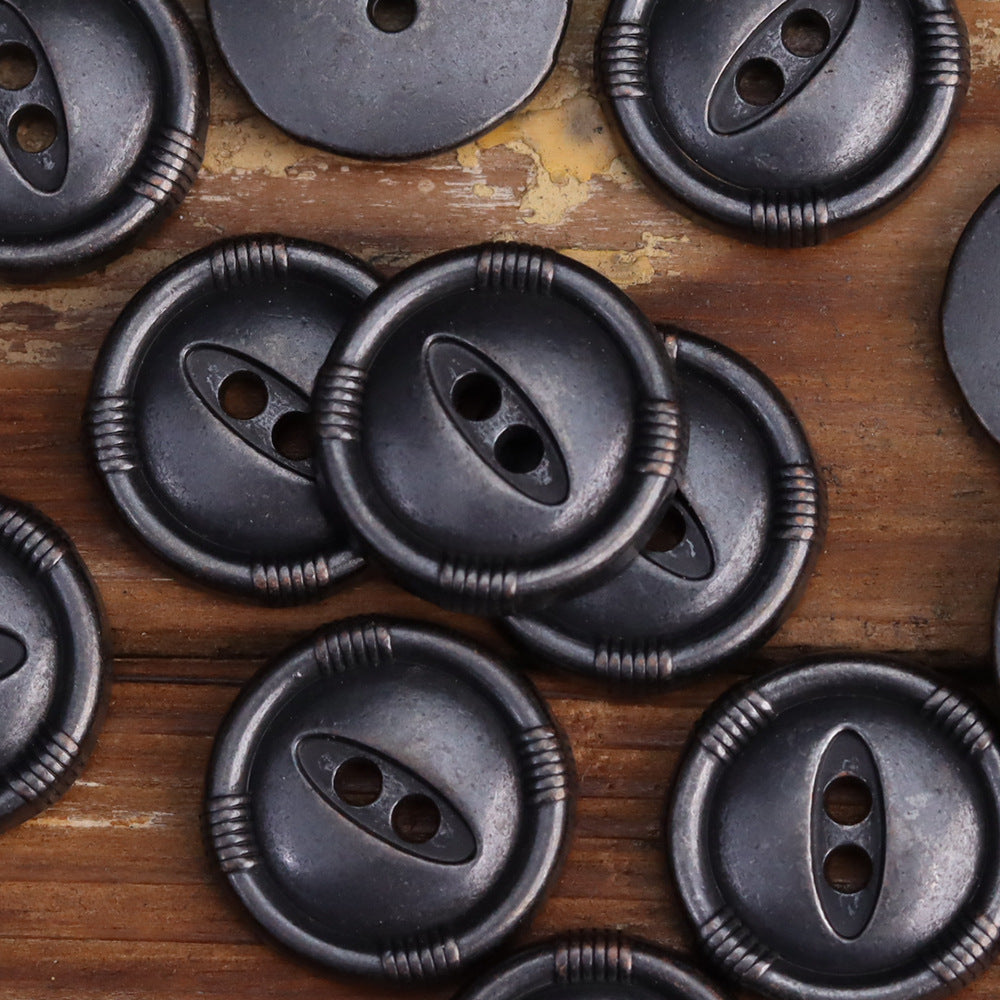 Black fish-eye metal buttons, two-hole face with ridged rim on round metal base