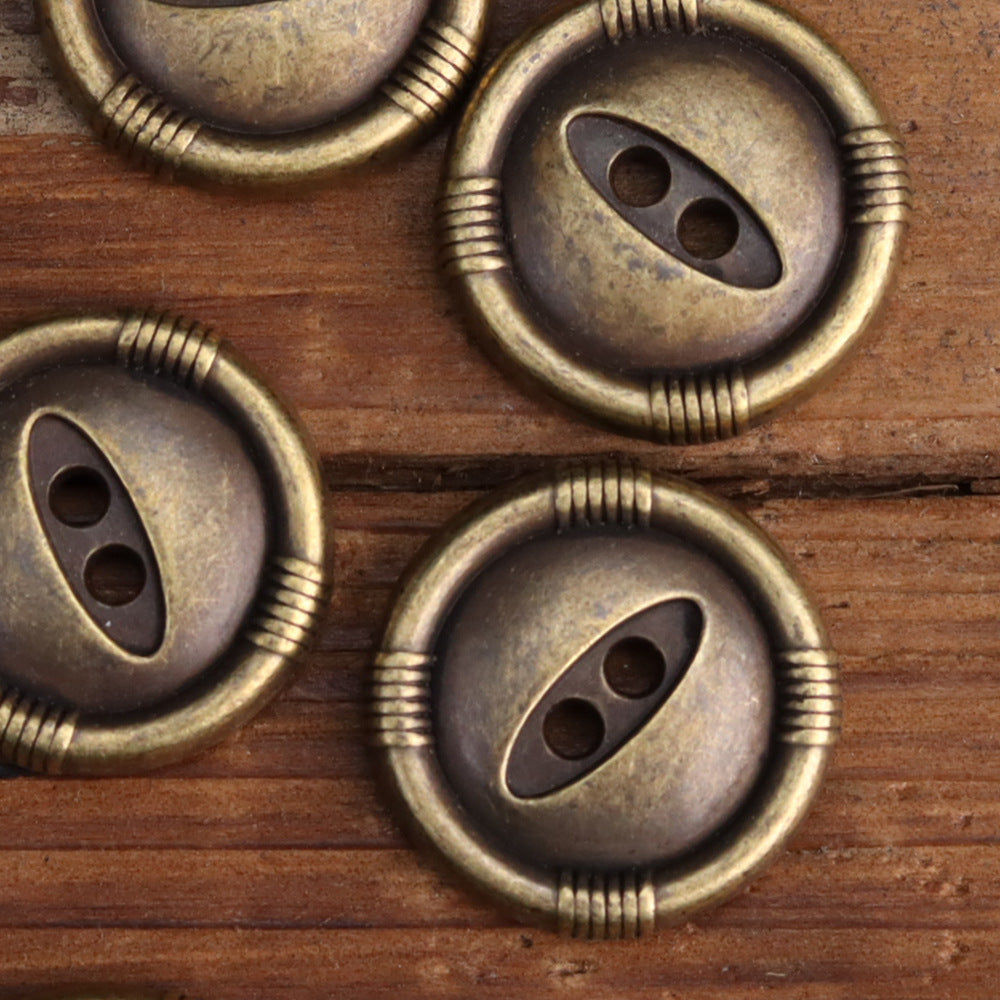 Bronze fish-eye metal buttons, two-hole oval cutout with ridged outer rim on round face