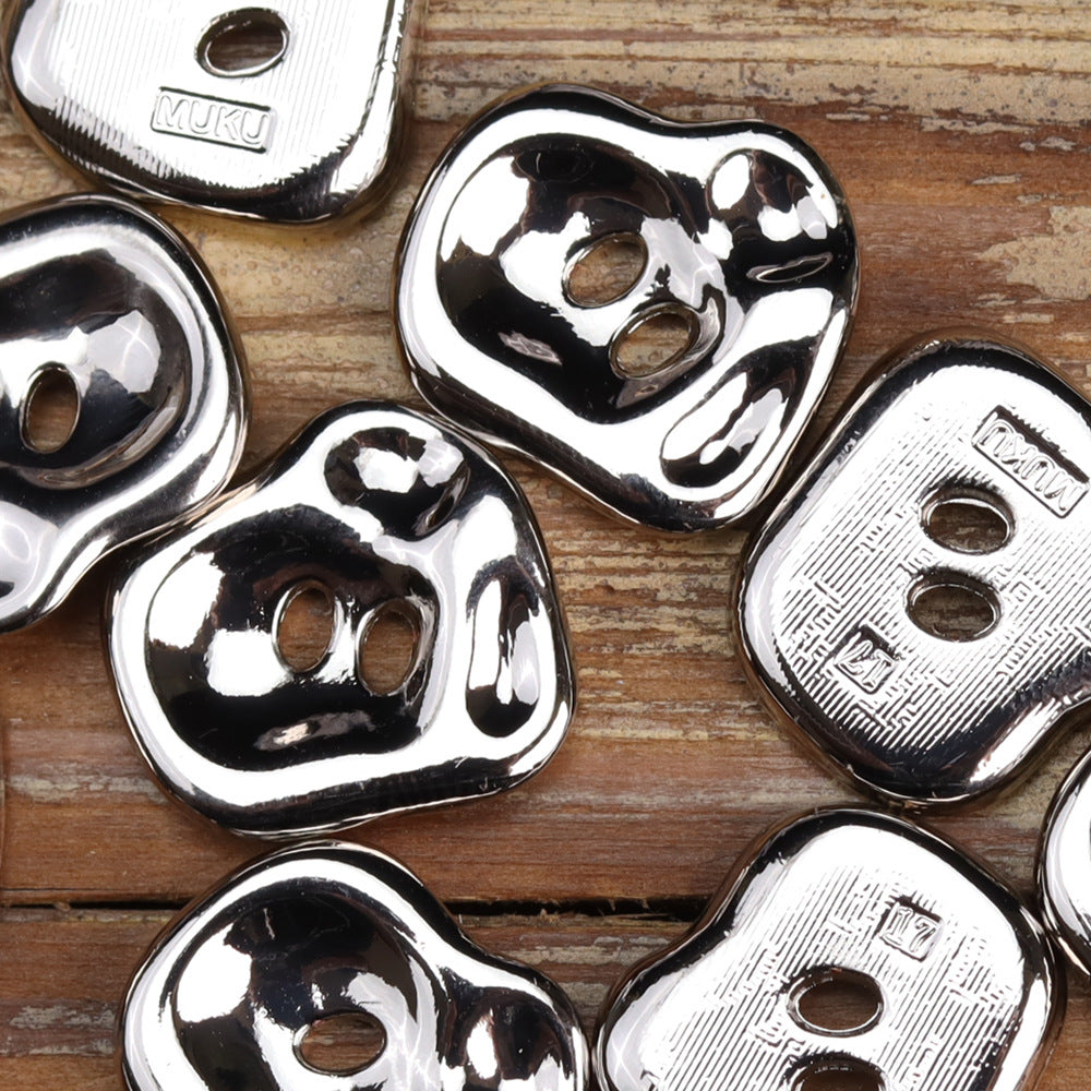 Shiny silver irregular two-hole metal buttons, textured sides and logo