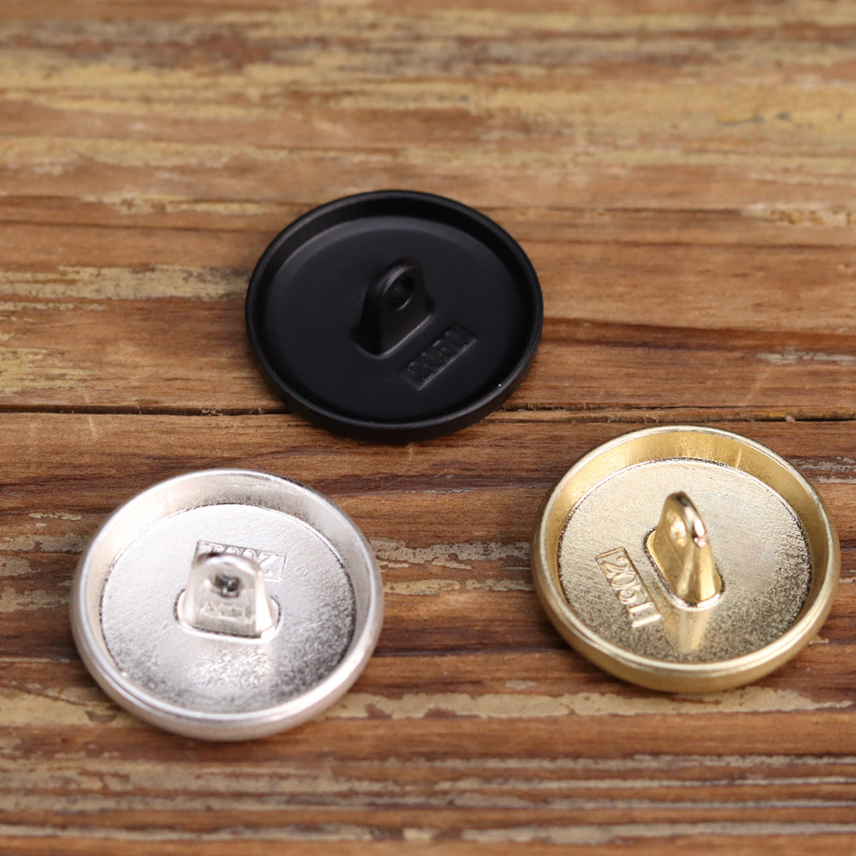 Back of matte flat-shank buttons: black, silver, gold with 2-hole shank