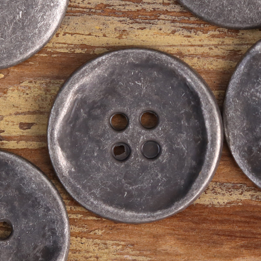 Antique silver 4-hole metal jacket button, round face with four holes