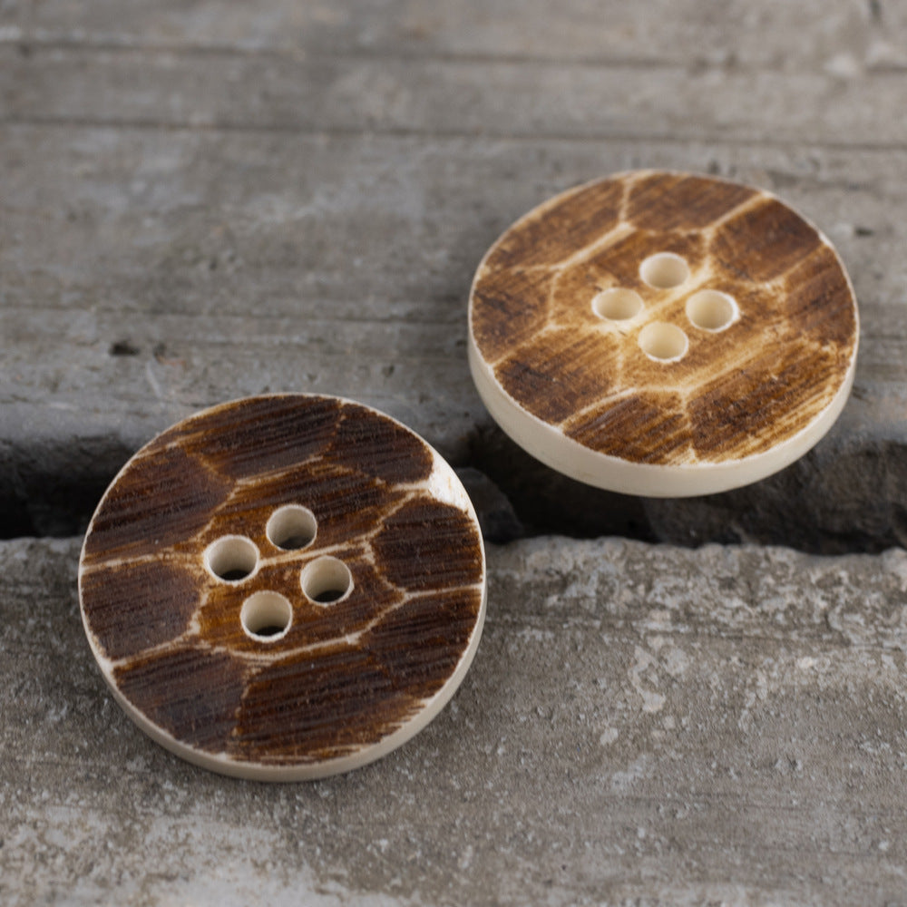 Set of two round 4-hole buttons in brown with light outer rim