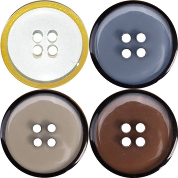 Four-hole transparent resin button with yellow-gold rim and dark center, jacket closure