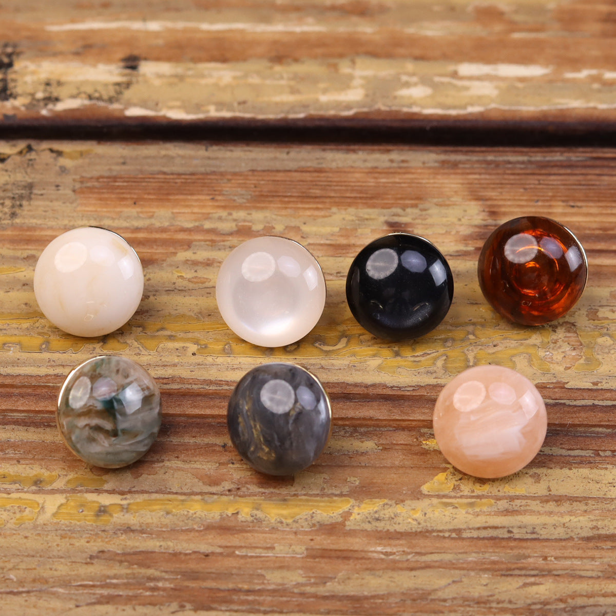 Chinese-style cat’s eye resin buttons, round mix of white, blush, black, gray, and amber