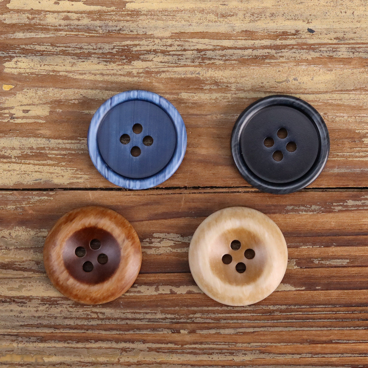 4-hole resin double-sided buttons for jackets: blue, black, light tan (khaki), dark brown.