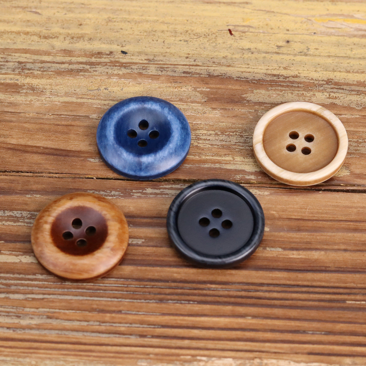 4-hole resin double-sided workwear buttons: blue, tan (khaki), dark coffee brown, black.