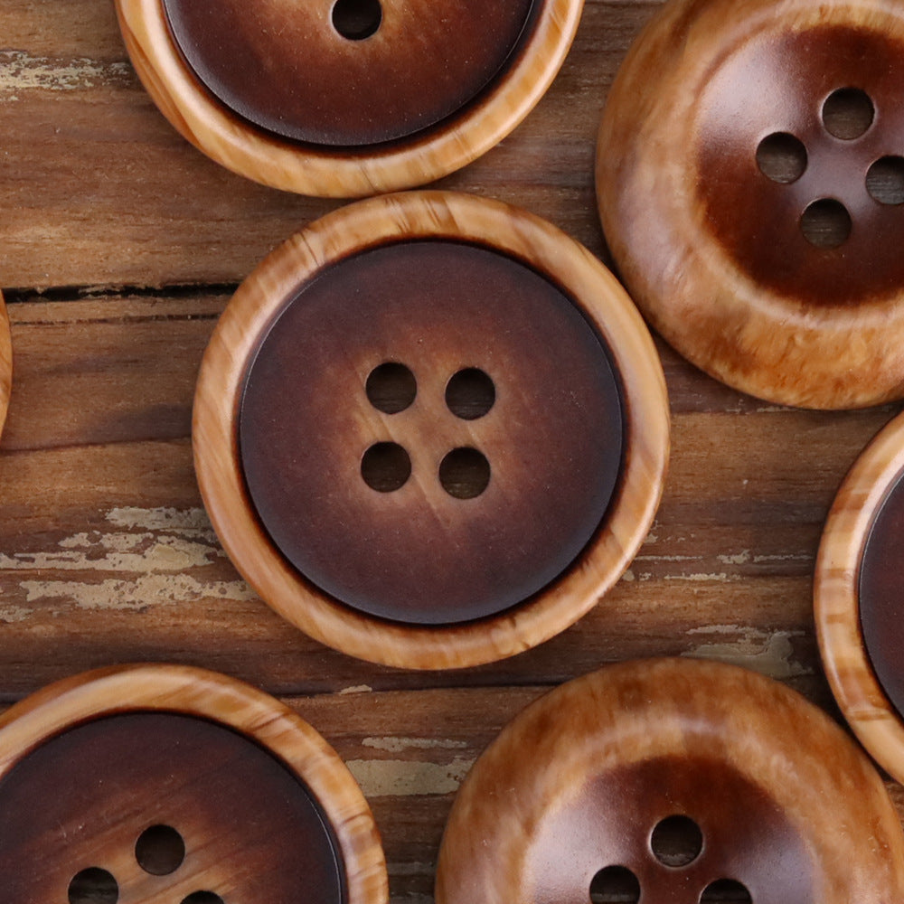Dark coffee resin double-sided buttons, round 4-hole design with light rim edge.